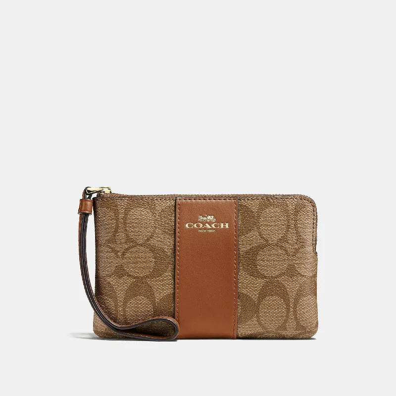 COACH Corner Zip Wristlet In Signature Canvas